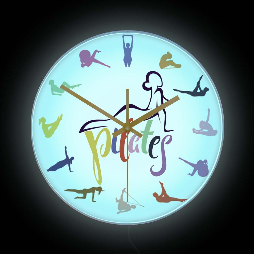 ساعة حائط ملونة بتصميم بيلاتس  - مراجعة Pilates Yoga Room وسعره